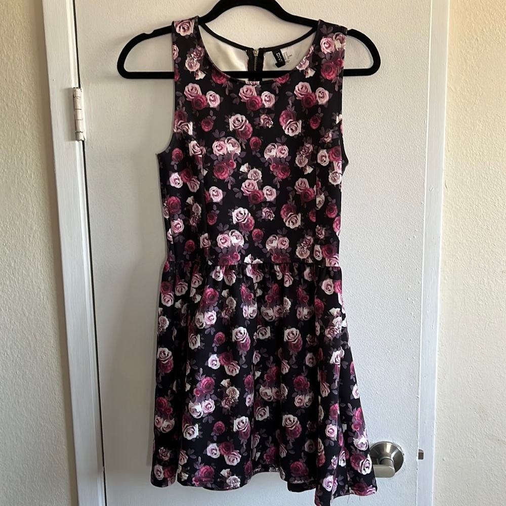 Sleeveless black, pink and white flowered dress. Size Small.